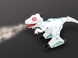 Динозавр FK501B танцует, выпускает пар, муз, свет, бат., Кор., 29,5-26,5-18 см.